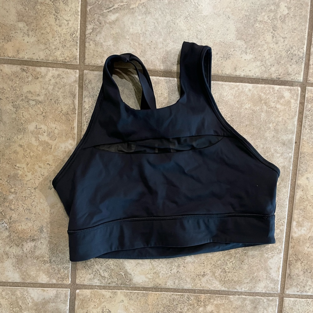 Lululemon black high neck sports bra. With mesh cut out.
